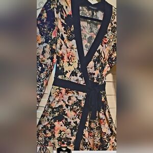 BCBG MAX AZARIA Wrap Dress  size Medium but can fit a large. It's a tie wrap!!